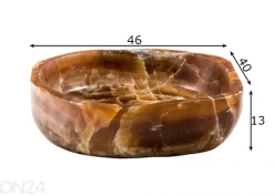 Pesuallas korukivestä