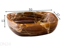 Pesuallas korukivestä
