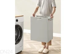 Pyykkikori hyllytasolla